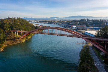 Rainbow Bridge and the City of La Conner, Washington. La Conner is a popular tourist town known for its arts and craft shops located in the beautiful Skagit Valley. Rainbow Bridge is an icon landmark.