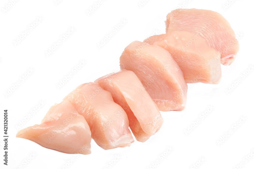 Wall mural Fresh raw sliced chicken breast fillet isolated closeup on white background, clipping path