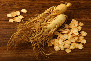 ginseng and slices ,medicine background.