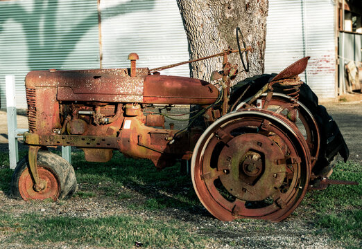 old rusty tractor on a small farm in Texas