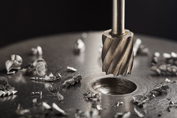 Milling сutter make sink in hole in steel billet. Locksmith work.