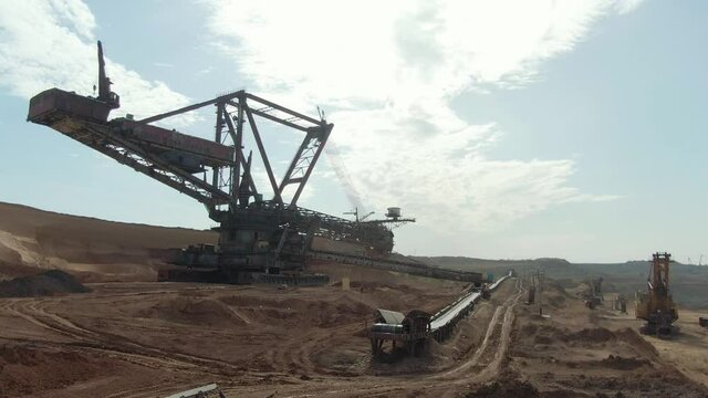 A large bucket-wheel rotary excavator. Manganese ore mining. 