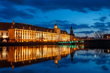 night view of the river and the old districts of the city of wroclaw in poland
