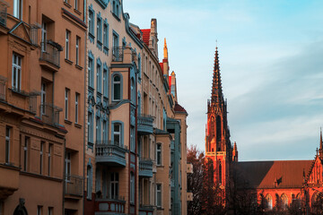 view of the beautiful evening street of wroclaw with a tower in poland