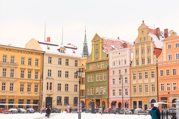 Fototapeta premium winter daytime snowy old buildings of wroclaw city in poland