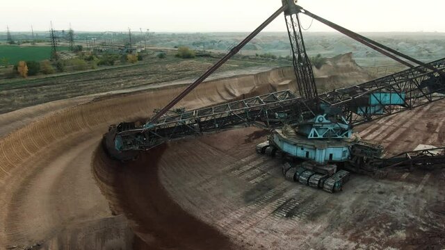 Large rotary excavator at the ore quarry.  Manganese ore mining. 