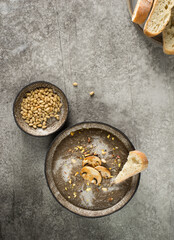 cream soup of champignons on a gray background