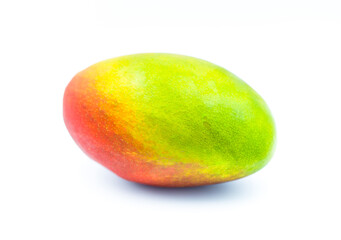 Whole mango fruit isolated on a white background. Fropical addition to slimming diets and a great natural snack. - obrazy, fototapety, plakaty