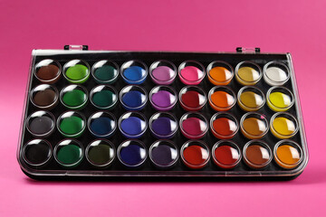 Set of watercolor paints with a closed lid