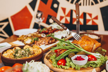 delicious European and Slavic cuisine on the big table waiting for guests. table with food, top view