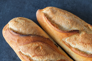 fresh  french bread on a board. Baguettes.