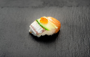nigiri assorted on a stone background