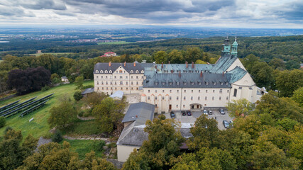 Fototapeta na wymiar A magnificent monastery with a basilica and a sanctuary on St. Anne's Mountain, a place of Christian worship in Poland in the province Silesia, aerial photos