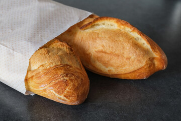 Fresh baked bread. French  flut. French baguette.