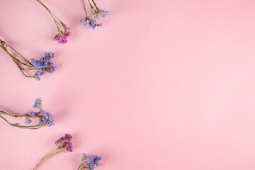 Fototapeta na wymiar blue with purple flower on table