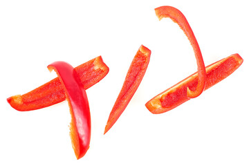 Red sweet bell pepper sliced strips isolated on a white background, top view. Red fresh paprika.