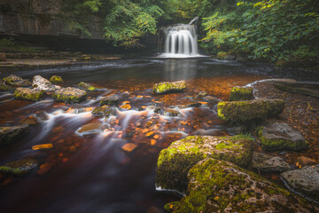 Beautiful nature waterfall scenery in a woodland forest at West Burton Falls or Cauldron Falls in...