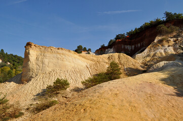 Red and white rocks in the south of France at the site of a former quarry - Colorado de Rustrel, France