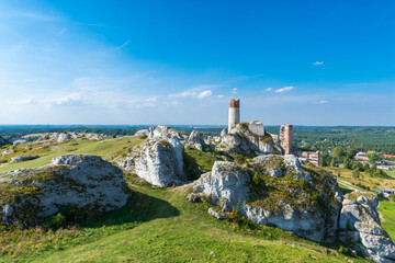 Fototapeta na wymiar Medieval castle in the village of Olsztyn in the autumn scenery. Trail of the Eagles Nests (Szlak Orlich Gniazd). Krakow - Czestochowa Upland.