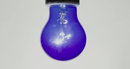 The ultraviolet light lights up on a white background. Disinfection concept