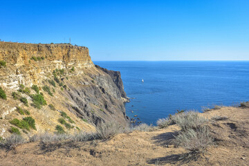 Cape Fiolent. Beautiful views of the Black Sea coast at Cape Fiolent in summer in clear weather. Aerial view to beautiful sea coast with turquoise water and rocks