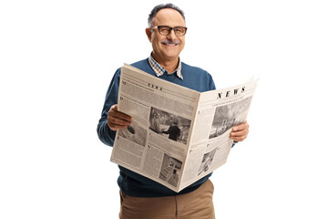Cheerful mature man holding a newspaper and smiling