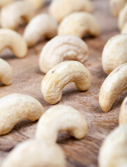 fresh raw cashew nuts on the kitchen table