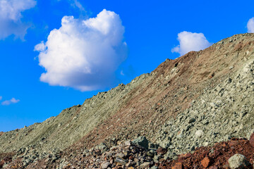 View of slag heaps of iron ore quarry. Mining industry