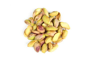 Peeled pistachio seeds isolated on white background.Group of salty pistachios  above