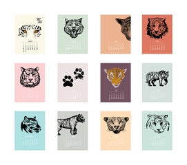 Fototapeta na wymiar Collection calendar design template for 2022. Year of Tiger according to the Chinese or Eastern calendar. Set of 12 pages and cover with a freehand drawing tiger. Vector isolated on white background.