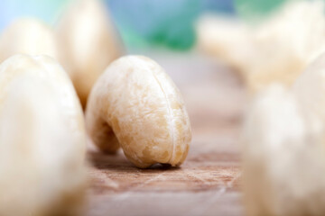 fresh raw cashew nuts on the kitchen table