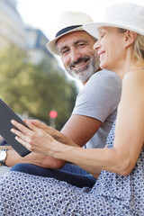 mature couple relaxing after shopping