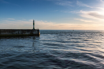 Small lighthouse on the coast of Aberystwyth, Wales.
