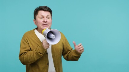 Serious mature brunet man speaker loudly talking holding megaphone near mouth, trying to explain, expressing his point of view, making announcement. Indoor studio shot isolated on blue background - Powered by Adobe