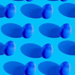blue Easter eggs with a shadow on a blue background seamless pattern