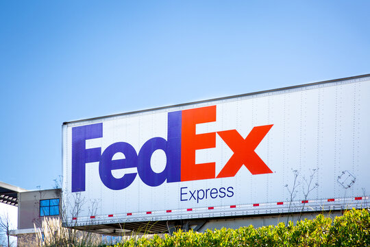 South San Francisco, CA, USA - February 24, 2021: Closeup of a Fedex container. FedEx Corporation is an American multinational delivery services company headquartered in Memphis, Tennessee