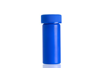 Plastic blue bottle on a white background. plastic bottle for medicines. blue plastic bottle for medicine or supplement product.
