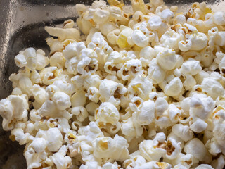 Top view. Popcorn ready to eat in detail.
