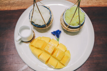 Mango with sticky rice and coconut milk , Tropical fruit. Thai dessert. Dessert fruit.