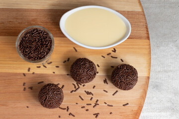 Delicious brigadeiro (brigadier), Brazilian sweet made with chocolate, butter and condensed milk.