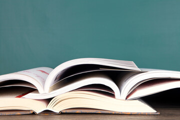 A large number of books opened