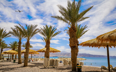 Morning on sandy beach in Eilat - famous tourist resort and recreation city in Israel