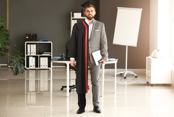 Comparison portrait of young man in bachelor robe and formal clothes in office