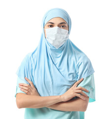 Female Muslim doctor in medical mask on white background