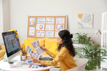Graphic designer working in office