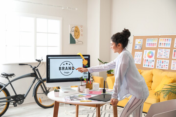 Graphic designer working in office