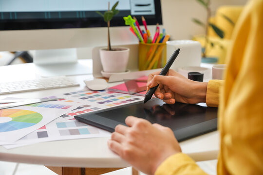Graphic designer working in office, closeup