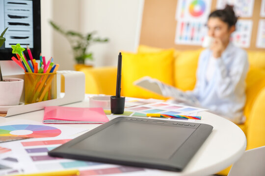 Workplace of graphic designer in office
