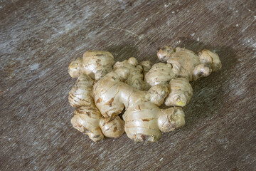 Ginger in wood background