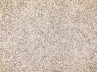 White cream gravel stucco painting wall texture close up